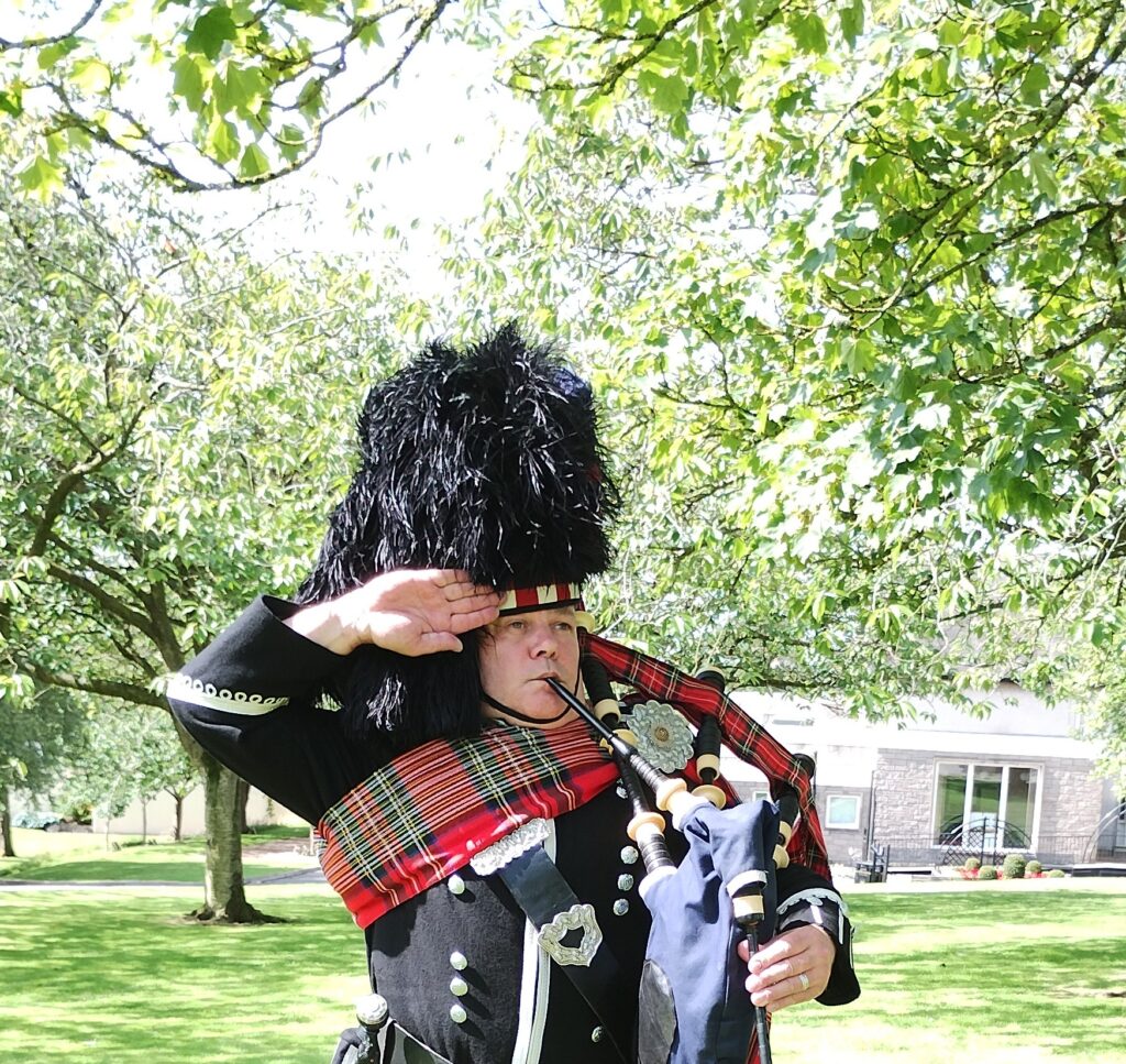 Regimental Scots Guards Piper services - hire for events and celebrations